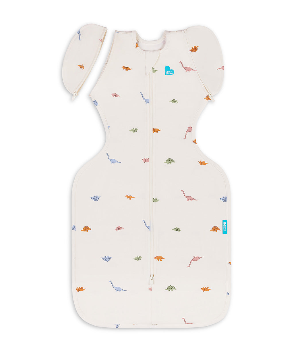 Swaddle Up™ 2-in-1 Übergangspucksack 1.0 TOG Baumwolle Creme Dino-Schnarch